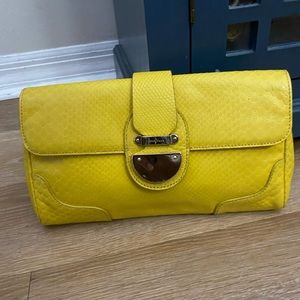 Cole Haan leather clutch in yellow skin